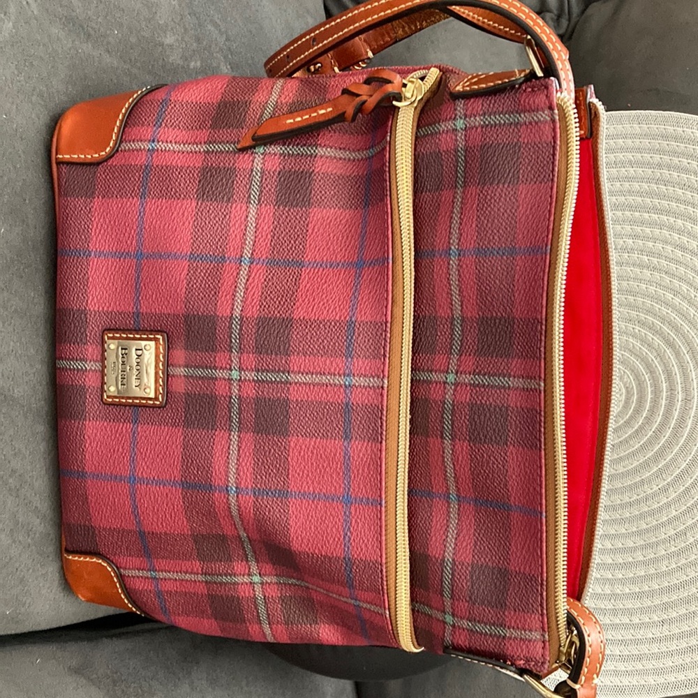 Designer handbag like new in mint condition. Could be worn as crossbody.